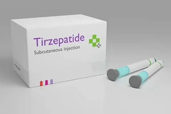 A pack labelled Tirzepatide subcutaneous injection beside two single-use weekly injection pens