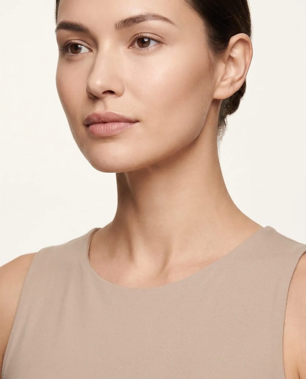 A woman’s cheek, jawline, chin and neck with smooth, hair-free skin after laser hair removal at Medrein Health